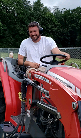 Photo of man on a tractor